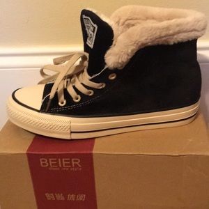 Cute and cozy high top sneakers.